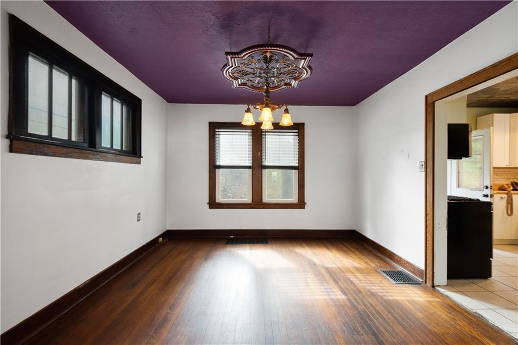 808 5th Avenue Coraopolis, PA 15108 - Photo 11 of 30 a view of empty room with wooden floor and fan