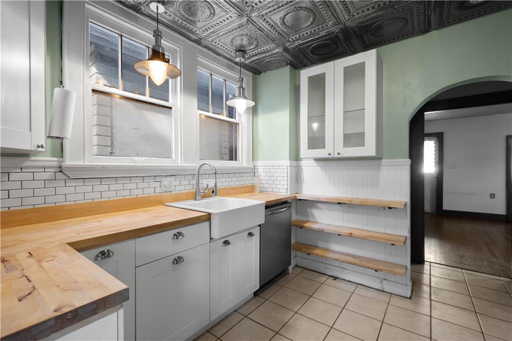 808 5th Avenue Coraopolis, PA 15108 - Photo 14 of 30 a kitchen with a sink and cabinets