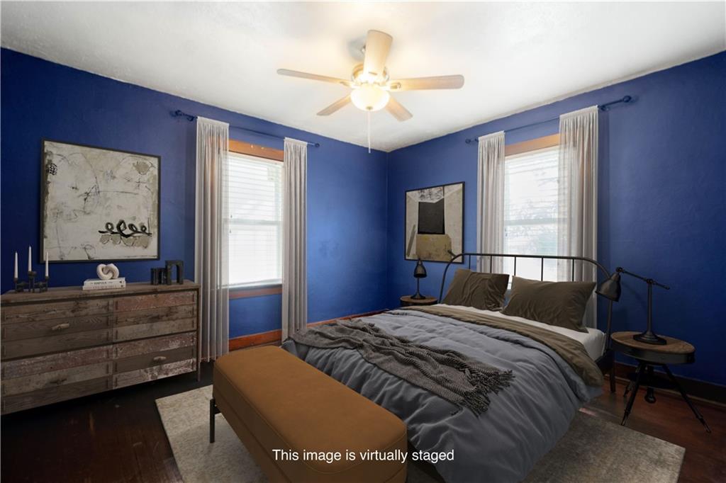 808 5th Avenue Coraopolis, PA 15108 - Photo 15 of 30 a bedroom with a bed and a chandelier