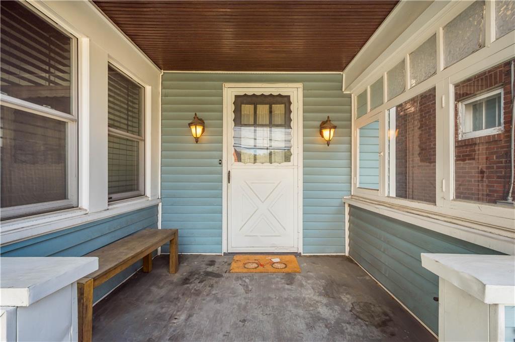 808 5th Avenue Coraopolis, PA 15108 - Photo 2 of 30 a view of wooden door and a window