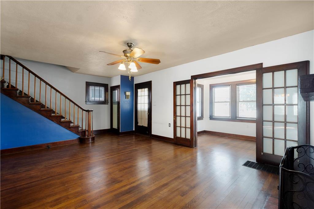 808 5th Avenue Coraopolis, PA 15108 - Photo 4 of 30 a view of an empty room with wooden floor and a window