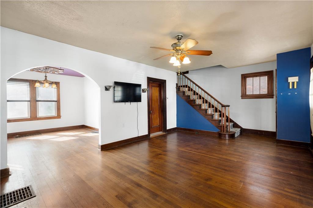 808 5th Avenue Coraopolis, PA 15108 - Photo 5 of 30 a view of an empty room with wooden floor and a window