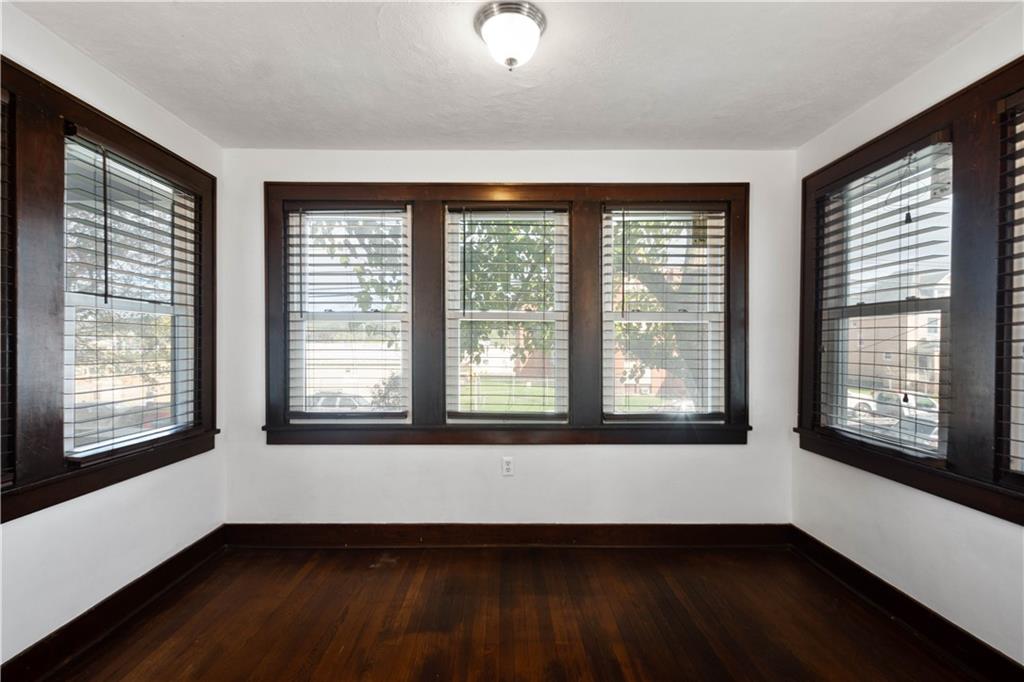 808 5th Avenue Coraopolis, PA 15108 - Photo 7 of 30 a view of an empty room with wooden floor and a window