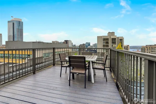 a view of a balcony with furniture