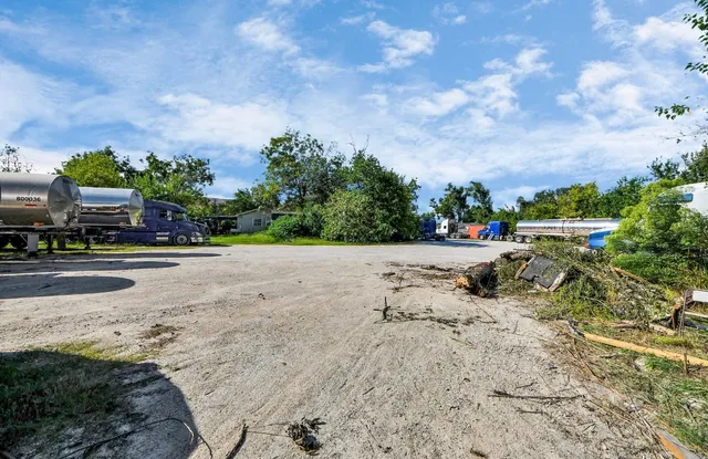 a view of backyard with green space