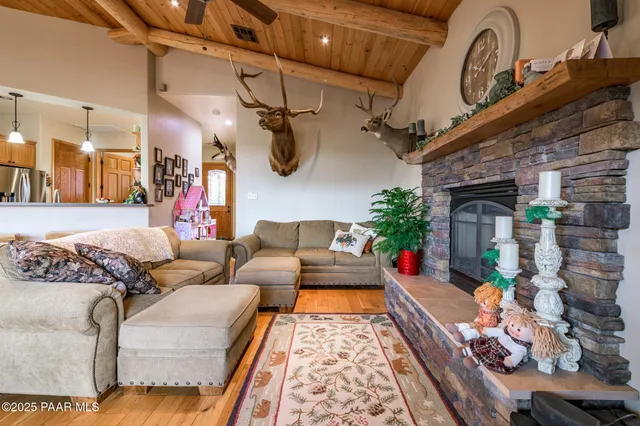 a kitchen with stainless steel appliances granite countertop a stove a sink dishwasher and a refrigerator