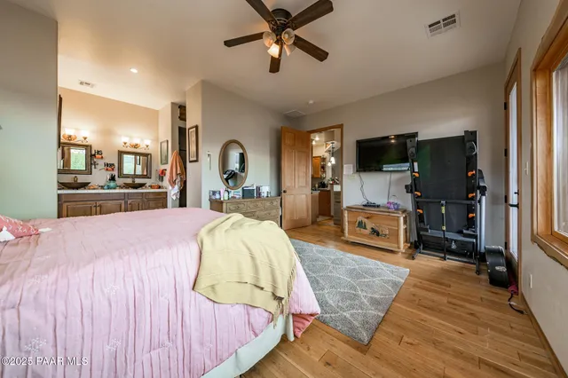 a bathroom with a tub and a shower curtain