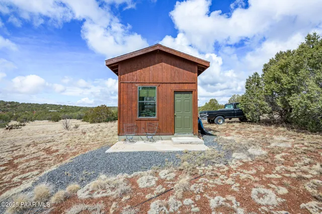 a view of a balcony with a chair