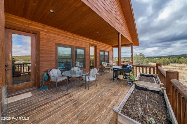 a view of balcony with furniture
