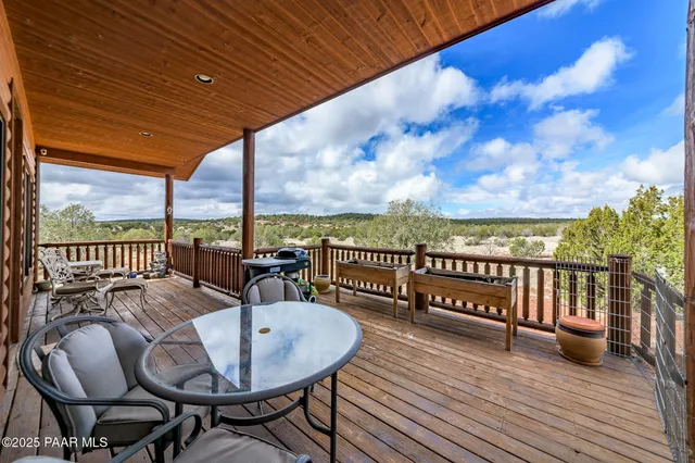 a living room with large windows
