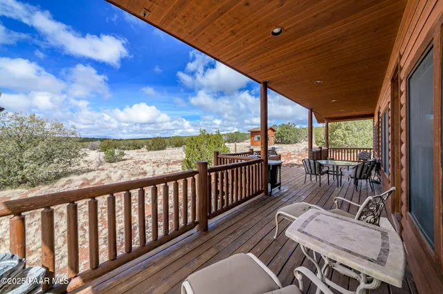 a front view of a house with yard and porch