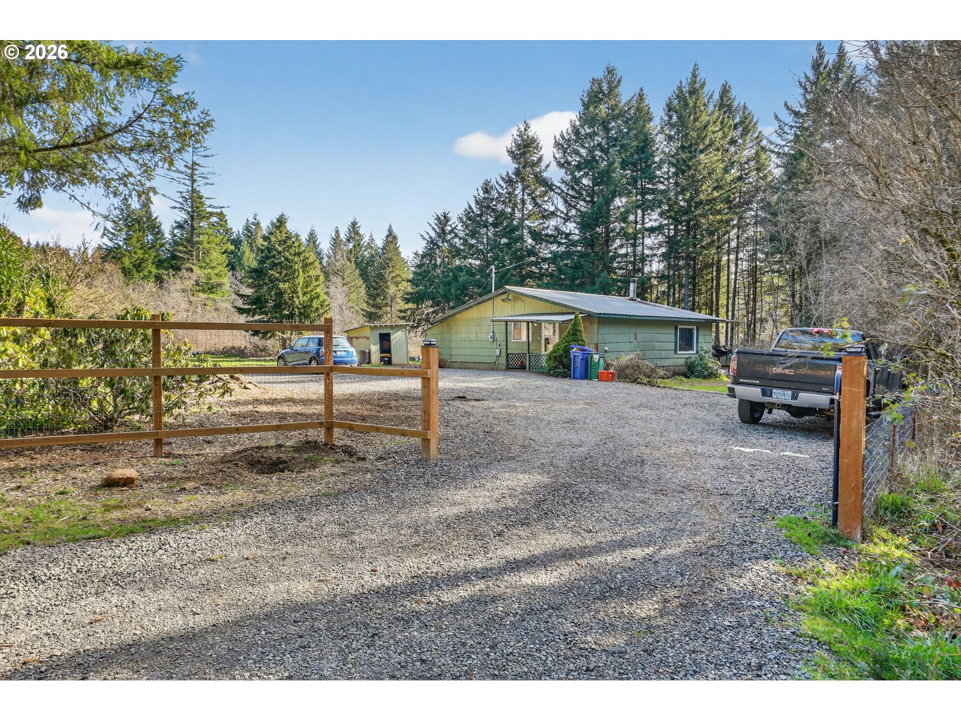 26200 Highway 211 Estacada, OR 97023 - Photo 1 of 24 a view of house with outdoor space and seating