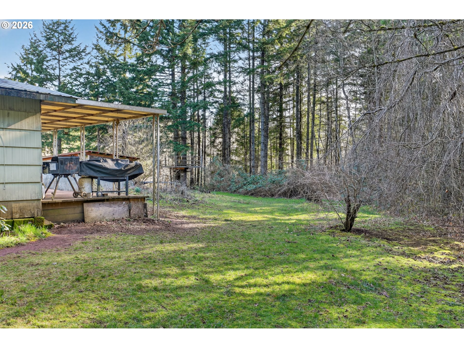 26200 Highway 211 Estacada, OR 97023 - Photo 13 of 24 a garden view with a seating space