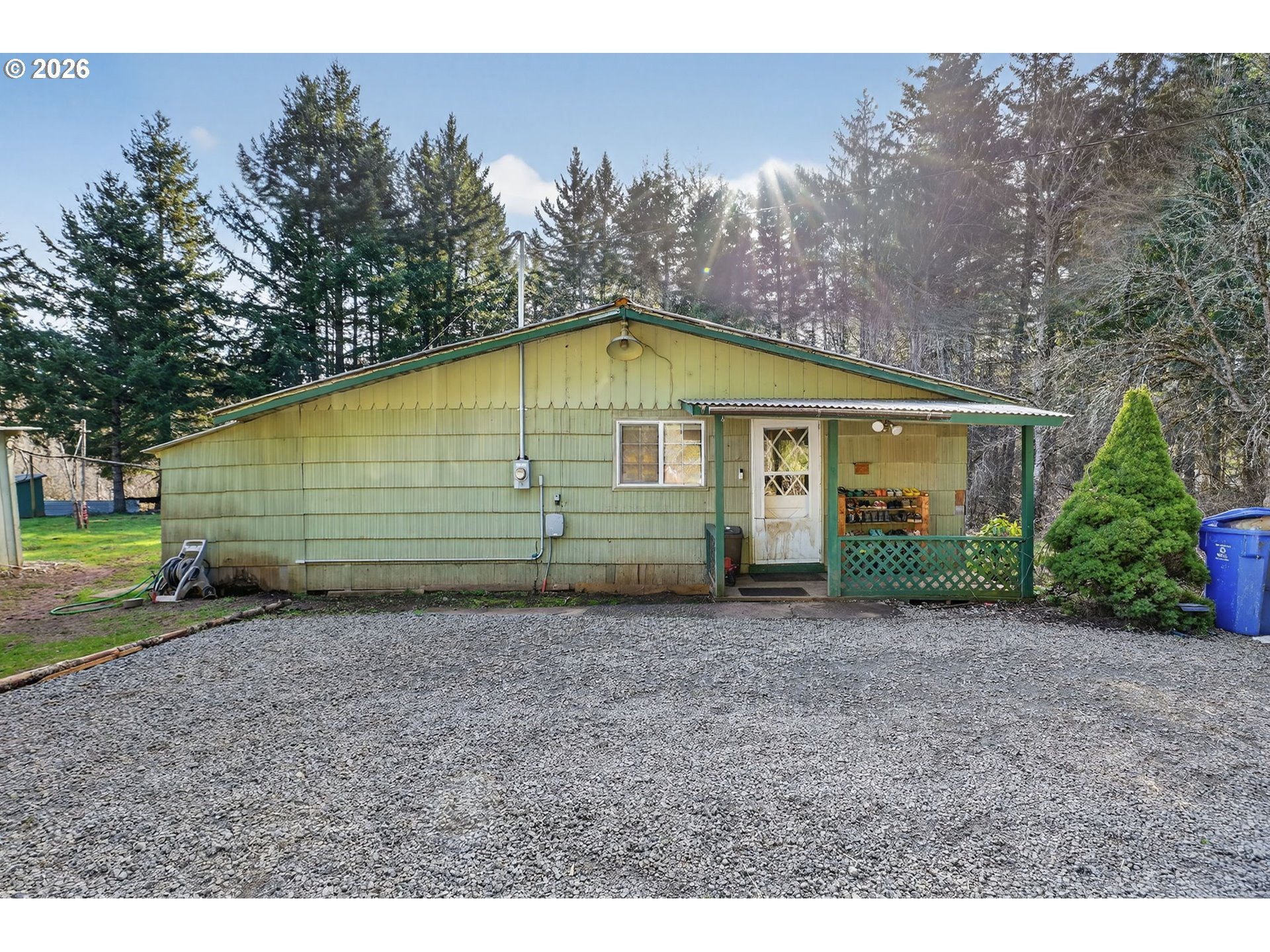 26200 Highway 211 Estacada, OR 97023 - Photo 3 of 24 a view of a house with a yard