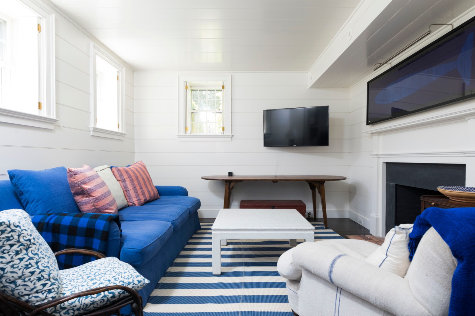 1 Twin Street Nantucket, MA 02554 - Photo 27 of 32 a living room with furniture and a flat screen tv