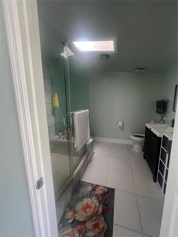 5855 Jack Brack Road St. Cloud, FL 34771 - Photo 75 of 86 a bathroom with a sink and toilet