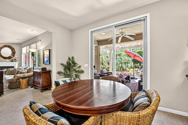 a bedroom that has a bed and a chandelier