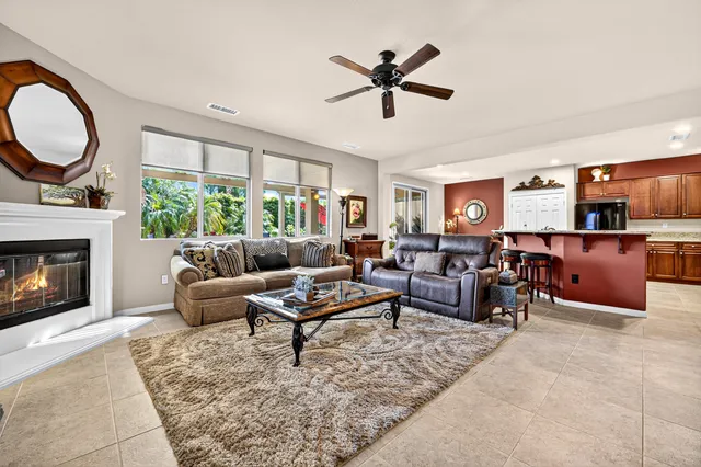 a spacious bathroom with a double vanity sink a mirror and shower