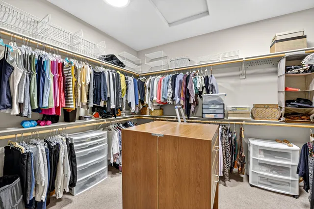 an outdoor living space with patio furniture and a potted plant