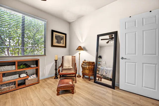 a view of a palm yard with swimming pool