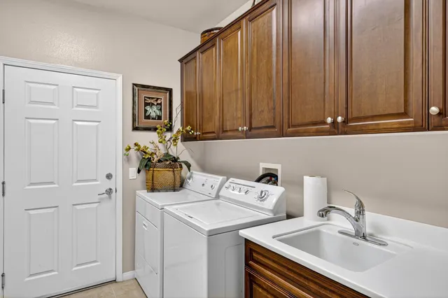 a view of a swimming pool and lounge chairs