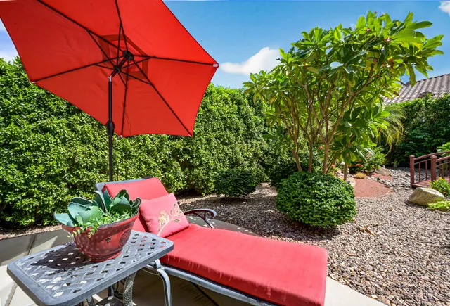 a view of a building with sitting area