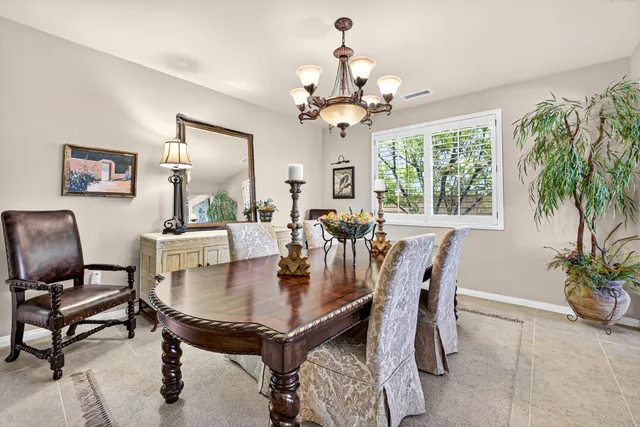 a kitchen with stainless steel appliances a sink stove and cabinets