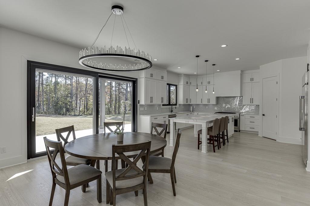 751 Rock Springs Road, Unit 2 Lawrenceville, GA 30043 - Photo 13 of 76 a view of a dining room with furniture window and outside view