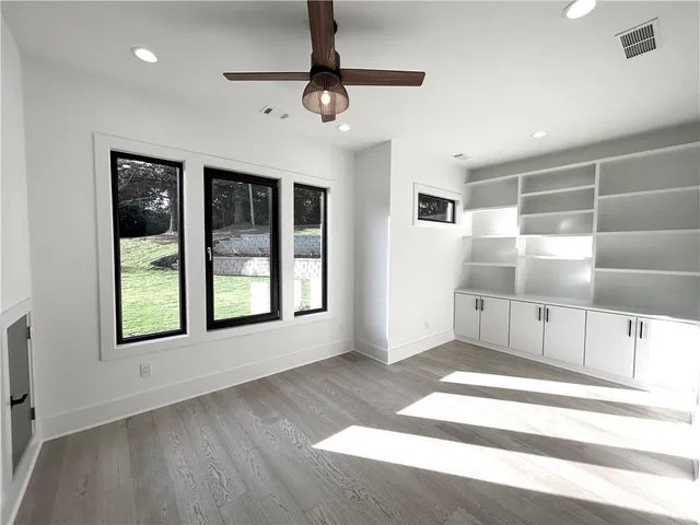 a bathroom with a bathtub and a sink