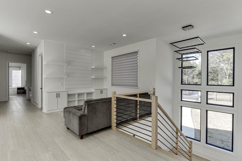 751 Rock Springs Road, Unit 2 Lawrenceville, GA 30043 - Photo 34 of 76 a kitchen with stainless steel appliances granite countertop a stove and a refrigerator