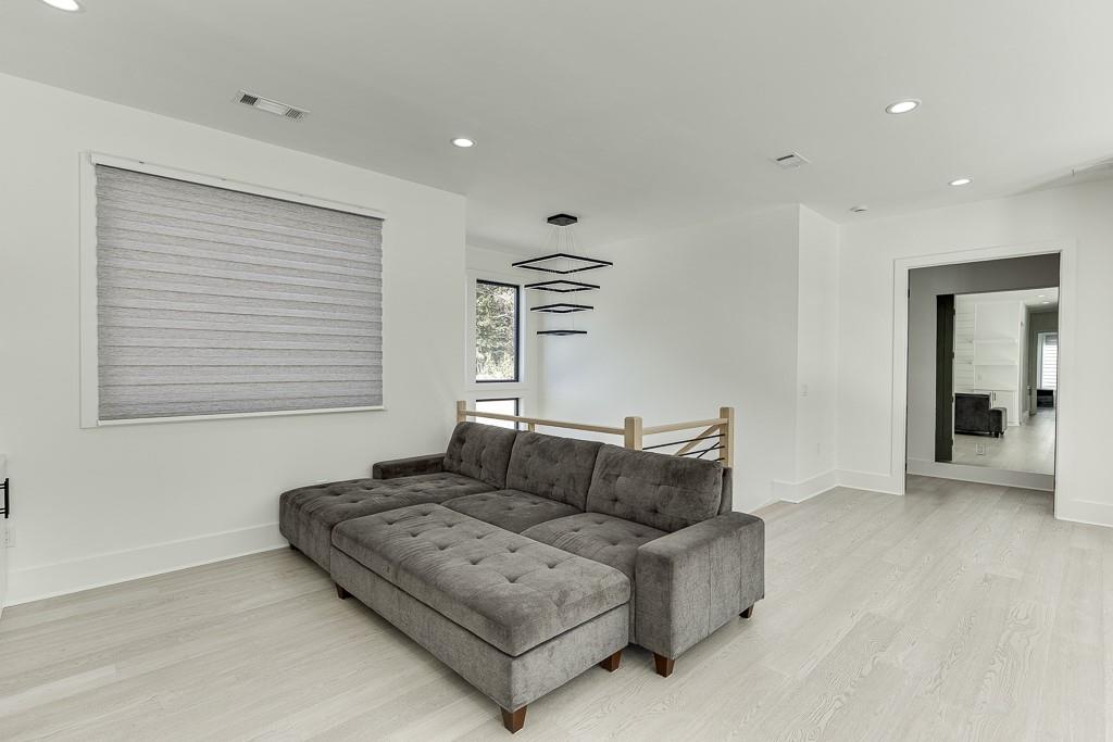 751 Rock Springs Road, Unit 2 Lawrenceville, GA 30043 - Photo 37 of 76 a living room with furniture and a window