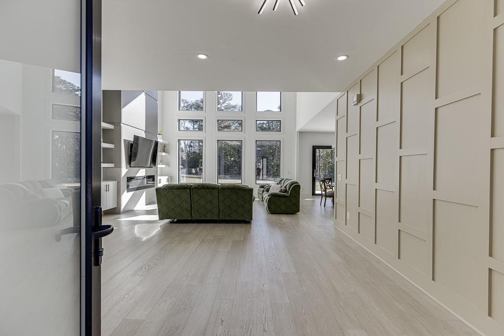 751 Rock Springs Road, Unit 2 Lawrenceville, GA 30043 - Photo 4 of 76 a living room with furniture a large window and a walk in closet