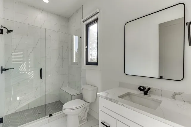 an aerial view of houses with outdoor space