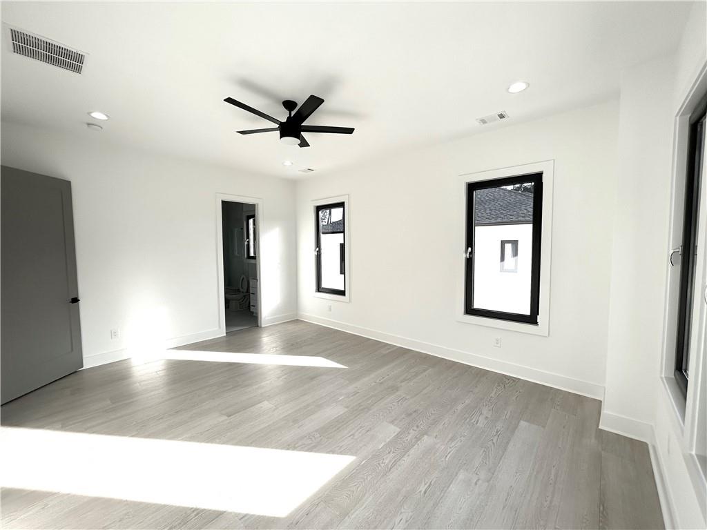 751 Rock Springs Road, Unit 2 Lawrenceville, GA 30043 - Photo 57 of 76 a view of livingroom with hardwood floor and a ceiling fan