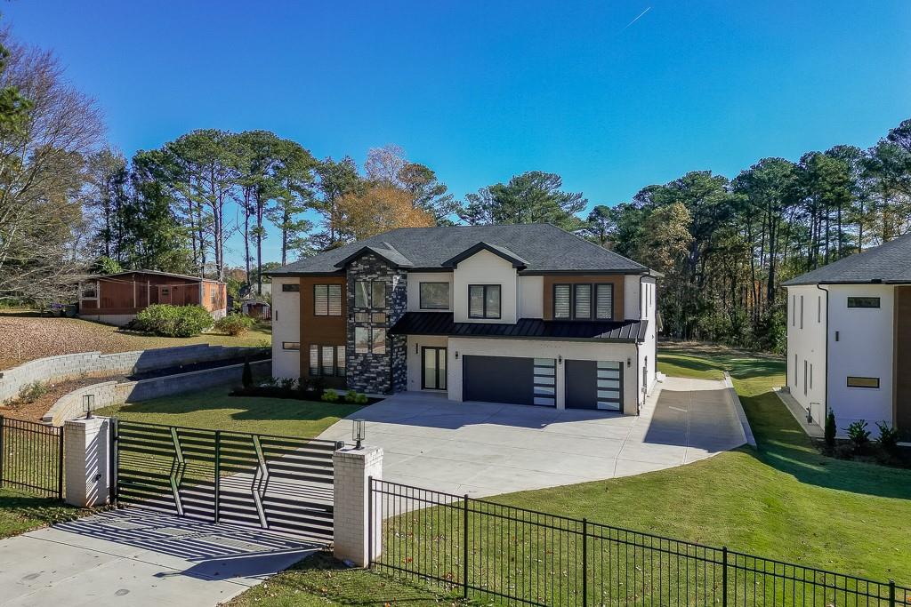 751 Rock Springs Road, Unit 2 Lawrenceville, GA 30043 - Photo 70 of 76 a view of house with outdoor space and sitting area