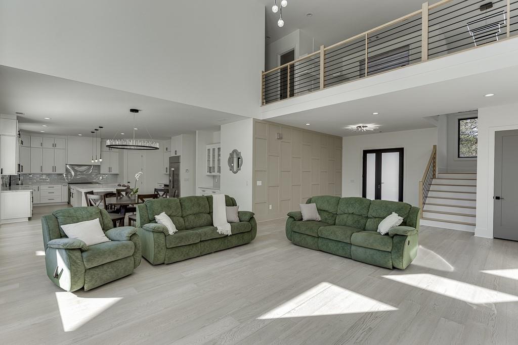 751 Rock Springs Road, Unit 2 Lawrenceville, GA 30043 - Photo 9 of 76 a living room with furniture and a wooden floor