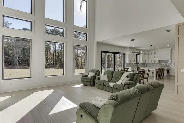 a view of a dining room with furniture window and outside view
