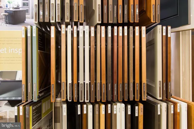 a kitchen with stainless steel appliances granite countertop a stove and cabinets