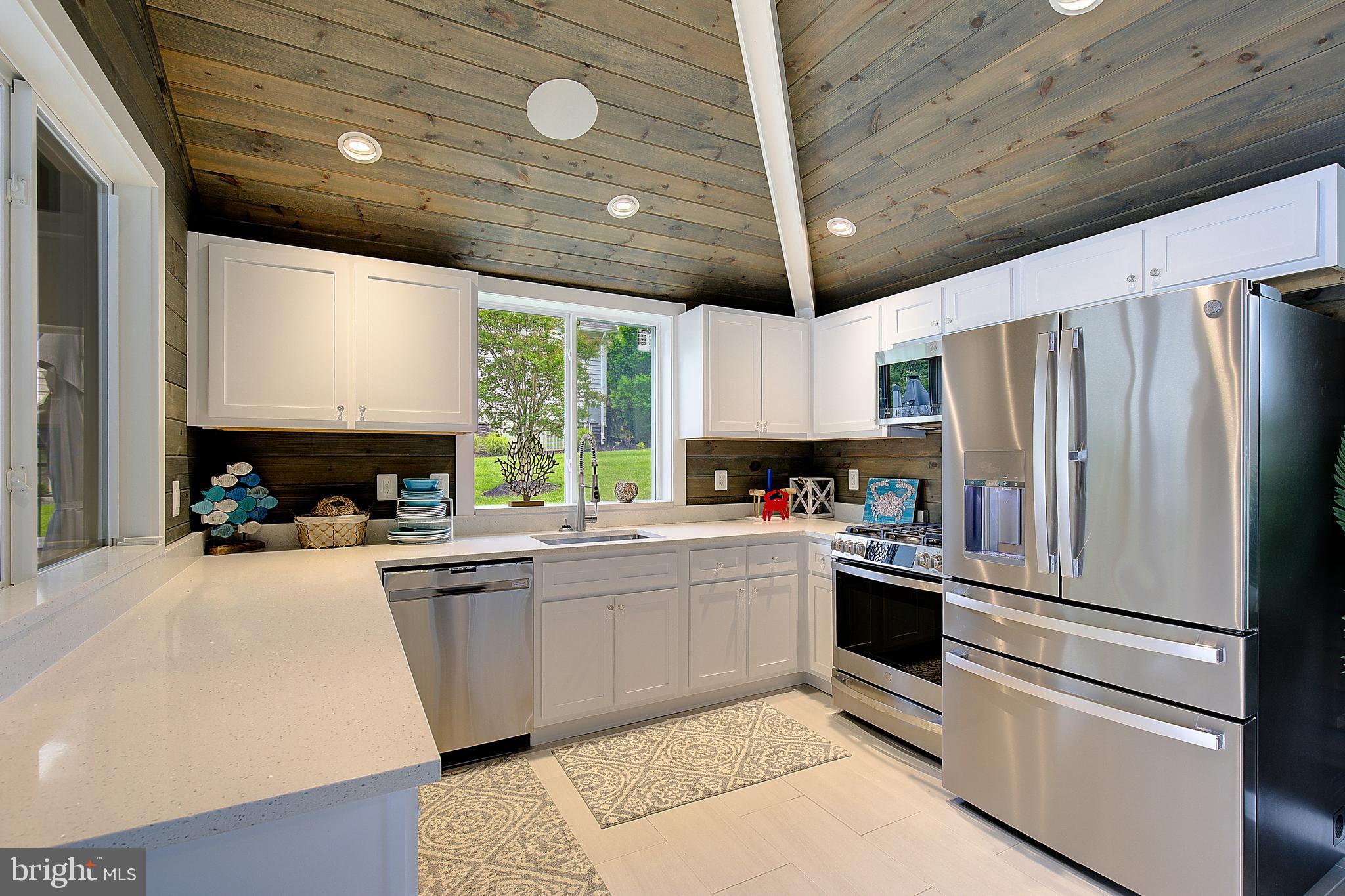 2393 Garrity Road St. Leonard, MD 20685 - Photo 69 of 76 Custom pool house kitchen with vaulted ceilings