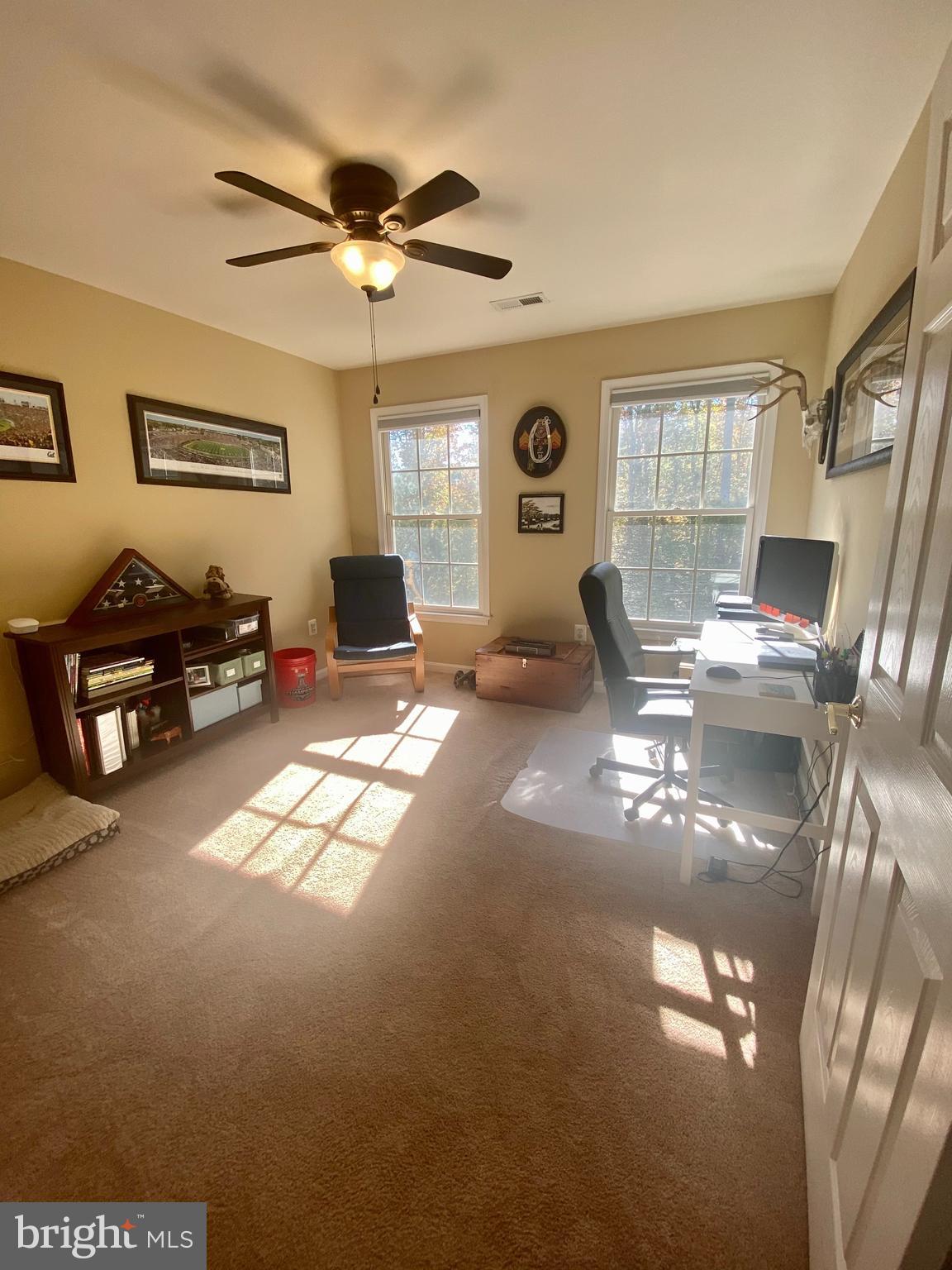 64 Tavern Road Stafford, VA 22554 - Photo 22 of 24 a living room with furniture and a window
