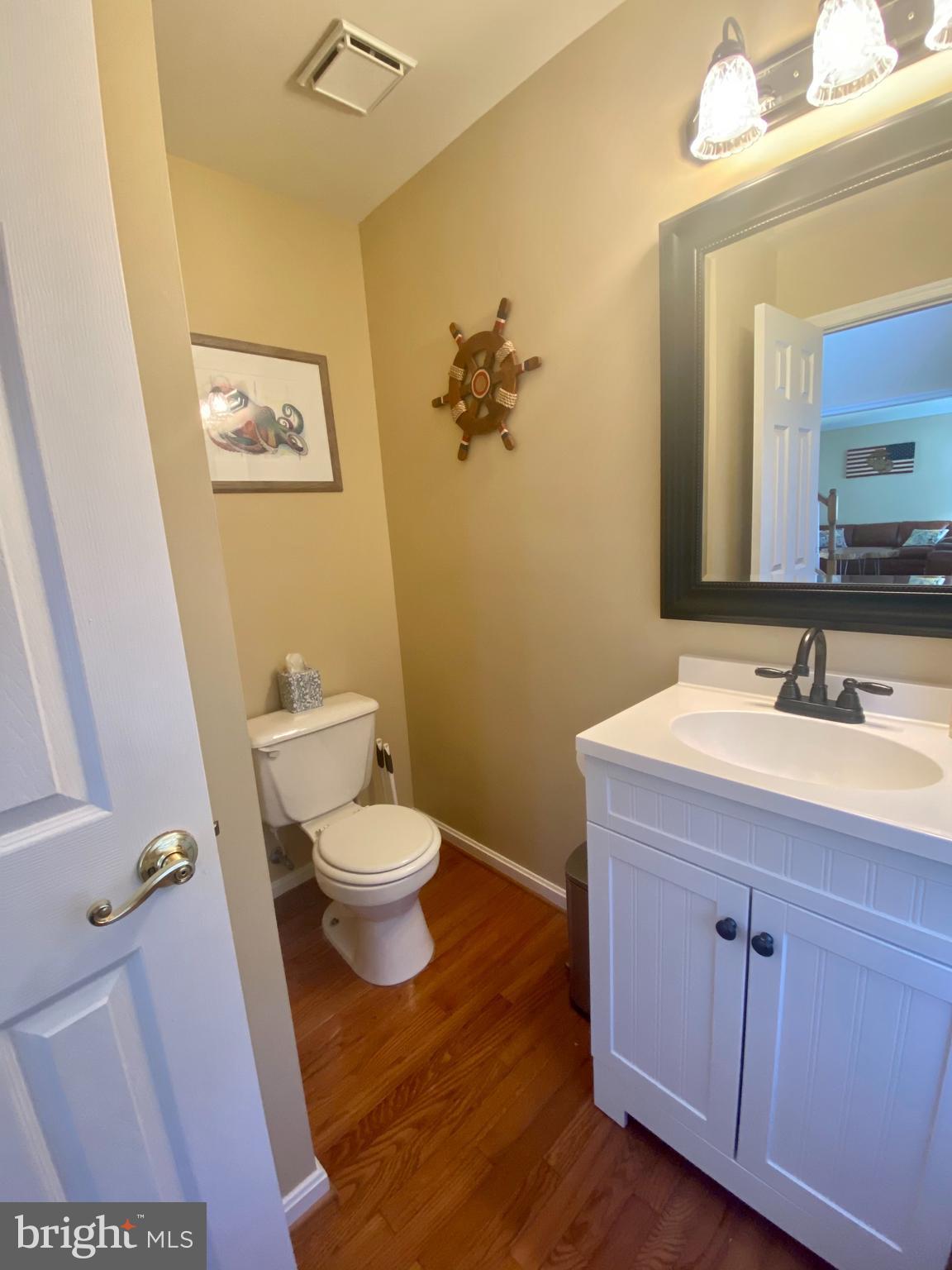 64 Tavern Road Stafford, VA 22554 - Photo 6 of 24 a bathroom with a granite countertop toilet sink and mirror