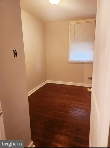 a view of small space with wooden floor