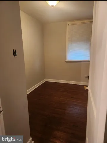 a view of small space with wooden floor