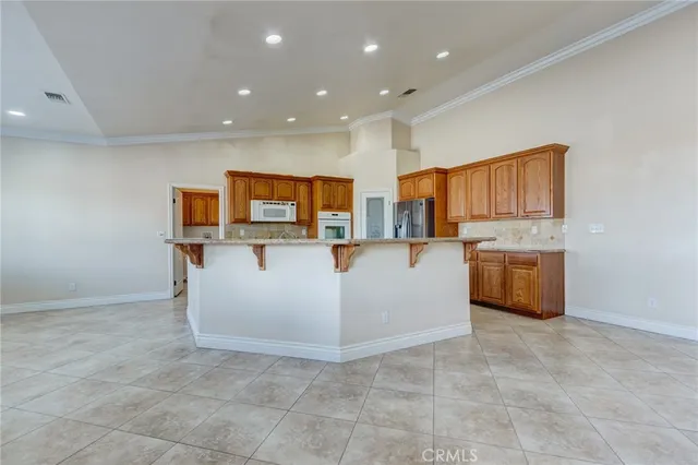 a view of a kitchen with a sink and a dishwasher