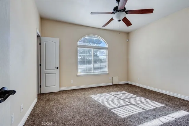 a kitchen with stainless steel appliances kitchen island a stove a sink a refrigerator and a oven