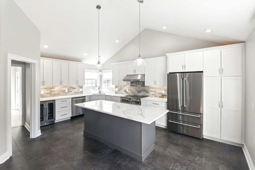 5 Bennett Road Hampden, MA 01036 - Photo 11 of 42 a kitchen with kitchen island a sink stainless steel appliances and cabinets