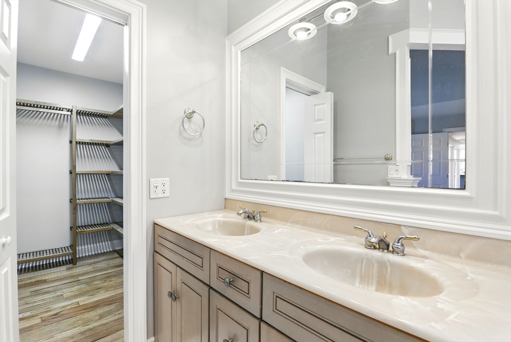 5 Bennett Road Hampden, MA 01036 - Photo 18 of 42 a bathroom with a sink and a mirror