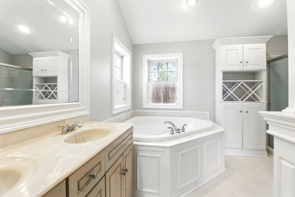 5 Bennett Road Hampden, MA 01036 - Photo 19 of 42 a bathroom with a sink double vanity and a tub
