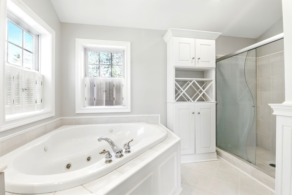 5 Bennett Road Hampden, MA 01036 - Photo 20 of 42 a white bath tub sitting next to a window
