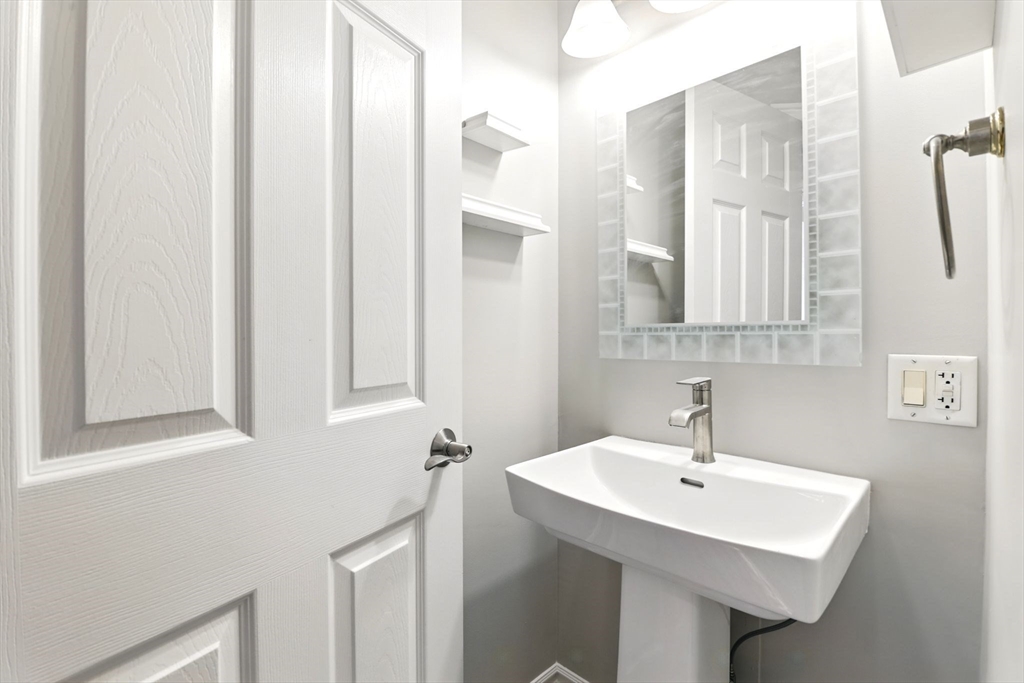 5 Bennett Road Hampden, MA 01036 - Photo 26 of 42 a bathroom with a sink and a mirror